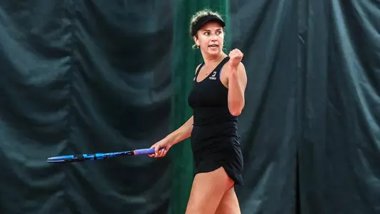 Franny Shea fist pumps after a point against Gardner-Webb on 4/7/23
