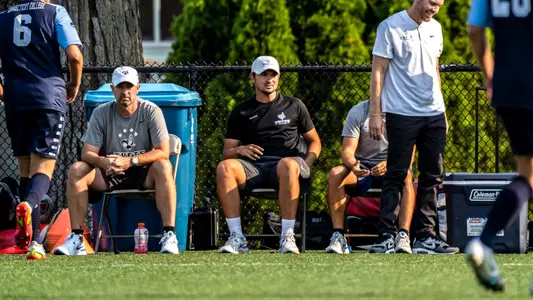 Max Lichtenstein coaches from the sideline