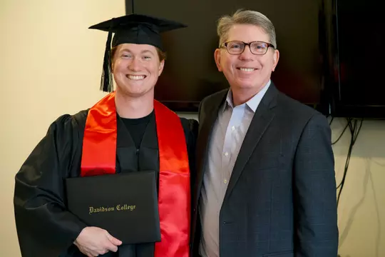 DeVos graduation with Doug Hicks