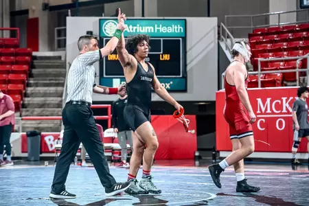 Cameo Blamkenship gets his hand raised