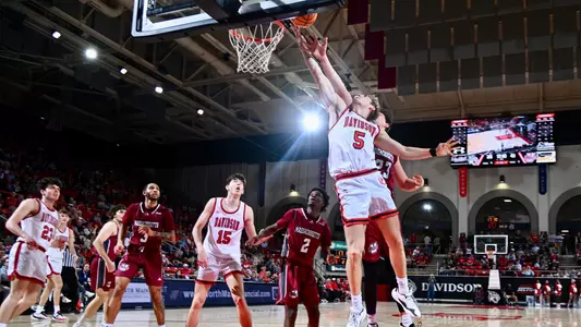Grant Huffman driving against UMass 2024