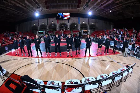Davidson Wrestling stands for the national anthem
