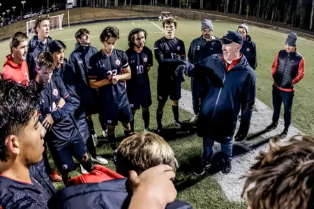 Mike Babst speaks to the men's soccer team