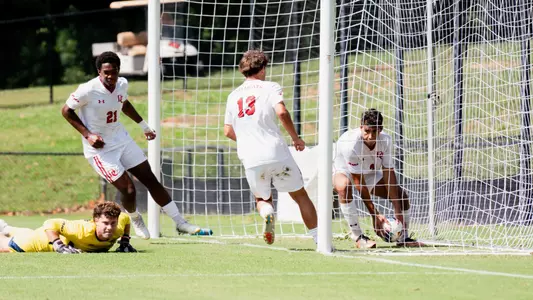Ayman Maadir grabs the ball from the net after scoring a PK goal