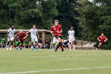 Denis Krioutchenkov scores a PK against UNCG