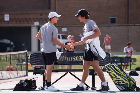 Davide Juancho handshake Davidson Invite