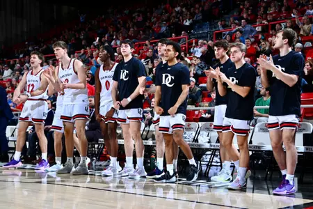 Davidson MBB bench celebrates 2025