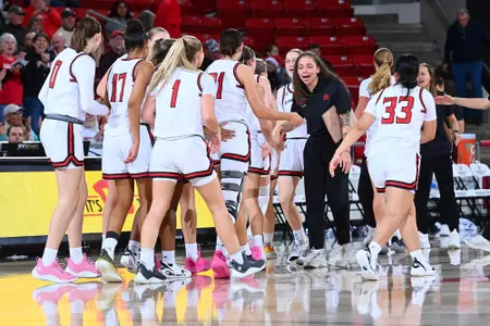 WBB Bench Huddle vs. Charlotte