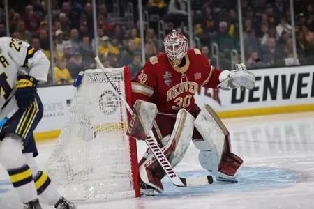 BOSTON, MA - APRIL 07: The Michigan Wolverines take on the Denver Pioneers in the Division I Men?s Ice Hockey Semifinals held at the TD Garden on April 07, 2022 in Boston, Massachusetts. (Photo by Damian Strohmeyer/NCAA Photos via Getty Images)