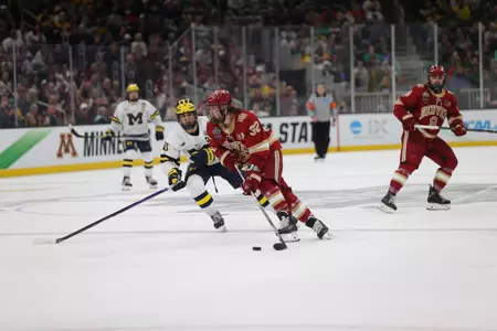 BOSTON, MA - APRIL 07: The Michigan Wolverines take on the Denver Pioneers in the Division I Men?s Ice Hockey Semifinals held at the TD Garden on April 07, 2022 in Boston, Massachusetts. (Photo by Damian Strohmeyer/NCAA Photos via Getty Images)