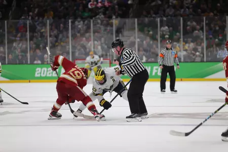 BOSTON, MA - APRIL 07: The Michigan Wolverines take on the Denver Pioneers in the Division I Men?s Ice Hockey Semifinals held at the TD Garden on April 07, 2022 in Boston, Massachusetts. (Photo by Damian Strohmeyer/NCAA Photos via Getty Images)