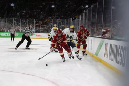 BOSTON, MA - APRIL 07: The Michigan Wolverines take on the Denver Pioneers in the Division I Men?s Ice Hockey Semifinals held at the TD Garden on April 07, 2022 in Boston, Massachusetts. (Photo by Damian Strohmeyer/NCAA Photos via Getty Images)