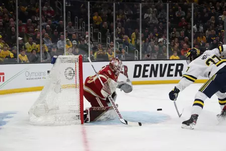 BOSTON, MA - APRIL 07: The Michigan Wolverines take on the Denver Pioneers in the Division I Men?s Ice Hockey Semifinals held at the TD Garden on April 07, 2022 in Boston, Massachusetts. (Photo by Damian Strohmeyer/NCAA Photos via Getty Images)