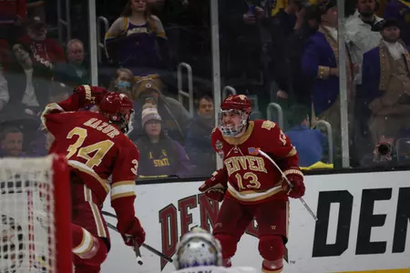 BOSTON, MA - APRIL 09: The Denver Pioneers take on the Minnesota State Mavericks during the Division I Men?s Ice Hockey Championship held at the TD Garden on April 09, 2022 in Boston, Massachusetts. (Photo by Damian Strohmeyer/NCAA Photos via Getty Images)