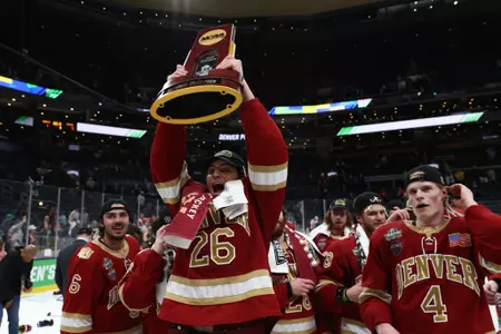 BOSTON, MA - APRIL 09: The Denver Pioneers take on the Minnesota State Mavericks during the Division I Men?s Ice Hockey Championship held at the TD Garden on April 09, 2022 in Boston, Massachusetts. (Photo by Damian Strohmeyer/NCAA Photos via Getty Images)