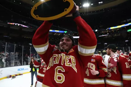 BOSTON, MA - APRIL 09: The Denver Pioneers take on the Minnesota State Mavericks during the Division I Men?s Ice Hockey Championship held at the TD Garden on April 09, 2022 in Boston, Massachusetts. (Photo by Damian Strohmeyer/NCAA Photos via Getty Images)