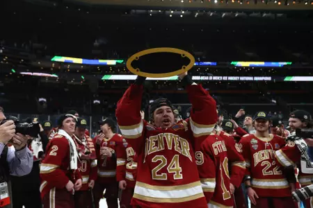 BOSTON, MA - APRIL 09: The Denver Pioneers take on the Minnesota State Mavericks during the Division I Men?s Ice Hockey Championship held at the TD Garden on April 09, 2022 in Boston, Massachusetts. (Photo by Damian Strohmeyer/NCAA Photos via Getty Images)