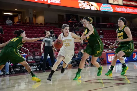 Junior Paige Bradley drives to the basket for two of her 20 points.