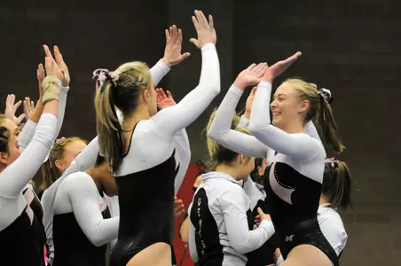 DU earned season highs on bars and beam