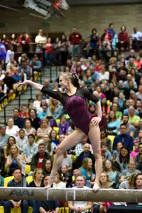 Ross won the all-around with a career-high 39.475. She also won the beam title and shared the bars title.