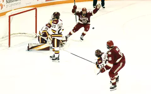 Tristan Broz Mike Benning celebrate Minnesota Duluth 2022 December 9