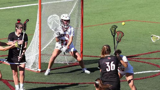 #14 Denver faces off against Louisville in Women's Lacrosse at Peter Barton Stadium in Denver, Colorado on February 13, 2022. The Pioneers defeated the Cardinals 19-9 on Sunday afternoon.