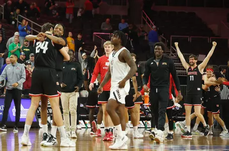 SIOUX FALLS, SD - MARCH 11: The Denver Pioneers celebrate close 66-63 win against the Nebraska-Omaha Mavericks at the 2024 Summit League Basketball Championship semifinal at the Denny Sanford Premier Center in Sioux Falls, South Dakota. (Photo by Richard Carlson/Inertia)