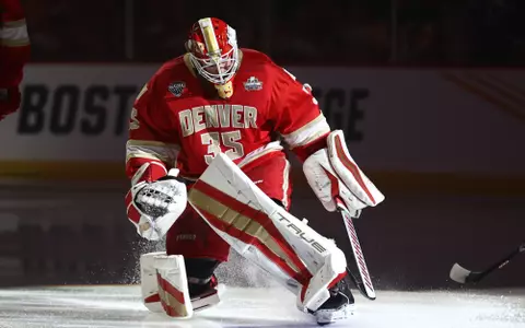 ST PAUL, MINNESOTA - APRIL 11: Matt Davis #35 of the Denver Pioneers is introduced before the game against the Boston University Terriers during the Division I Men?s Ice Hockey Semifinals held at Xcel Energy Center on April 11, 2024 in St Paul, Minnesota. (Photo by Tyler Schank/NCAA Photos via Getty Images)