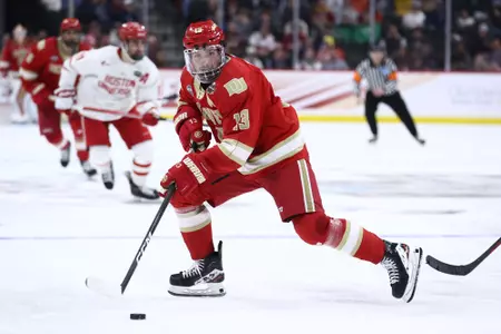 ST PAUL, MINNESOTA - APRIL 11: Massimo Rizzo #13 of the Denver Pioneers skates with the puck against the Boston University Terriers in the third period during the Division I Men?s Ice Hockey Semifinals held at Xcel Energy Center on April 11, 2024 in St Paul, Minnesota. (Photo by Tyler Schank/NCAA Photos via Getty Images)