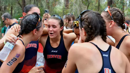 Olivia Ebenstein 2024 November 9 National Championships team celebrate