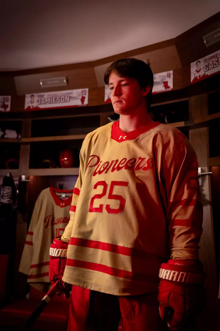 The Denver Pioneers hockey team reveals a new 'Golden Age' jersey to be worn on Friday, October 16, 2026 for the faceoff against the No. 2 Michigan and the 11th National Championship Banner.