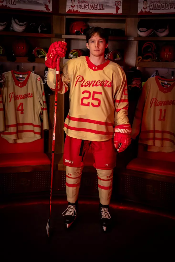 The Denver Pioneers hockey team reveals a new 'Golden Age' jersey to be worn on Friday, October 16, 2026 for the faceoff against the No. 2 Michigan and the 11th National Championship Banner.