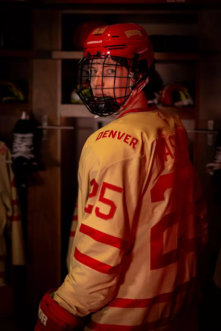 The Denver Pioneers hockey team reveals a new 'Golden Age' jersey to be worn on Friday, October 16, 2026 for the faceoff against the No. 2 Michigan and the 11th National Championship Banner.
