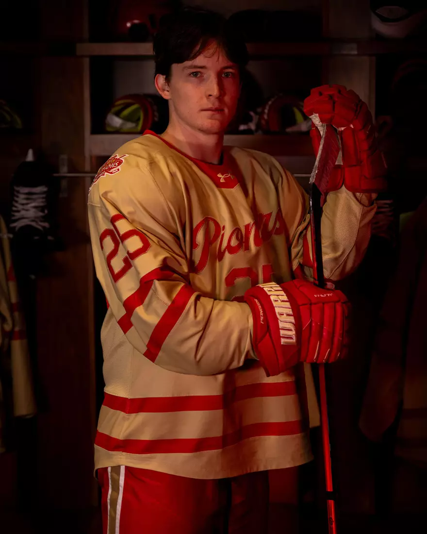 The Denver Pioneers hockey team reveals a new 'Golden Age' jersey to be worn on Friday, October 16, 2026 for the faceoff against the No. 2 Michigan and the 11th National Championship Banner.