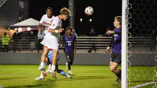 Erik Collins heads a goal in at Portland.