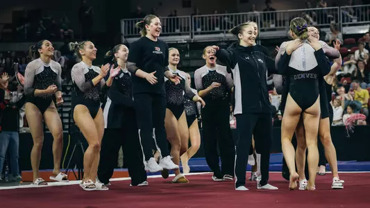 University of Denver Gymnastics Team Celebration on Floor - February 1, 2026