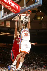 Wilson Chandler started his fourth NBA season with 22 points in a win for New York on Wednesday.