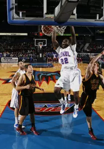 Tony Freeland slams home two of his team-high 16 points in Saturday's 81-74 win over Loyola-Chicago.