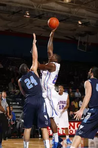 Tony Freeland's career-high 25 points and game-high nine rebounds led DePaul past Northern Illinois.