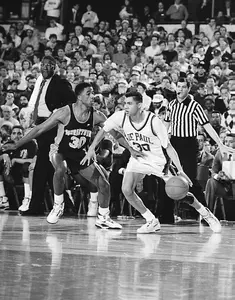 David Booth played at DePaul from 1988-92 before joining the men's basektball staff in May 2009.
