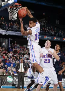 Cleveland Melvin came away with 25 points and 12 rebounds in Saturday's 82-62 loss to Connecticut.