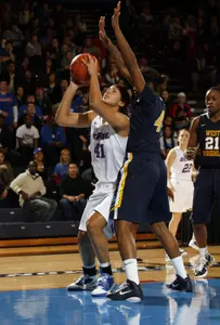 Felicia Chester scored 15 points in DePaul's 78-55 win over #8/8 West Virginia on Sunday at McGrath Arena