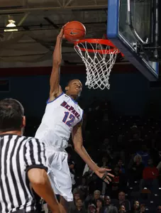 Cleveland Melvin scored 33 points with eight rebounds in DePaul's exhibition win over Lewis.