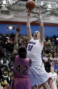 Katherine Harry led paced DePaul with six rebounds against Marquette. The Blue Demons topped the Golden Eagles 64-56 on Saturday at McGrath Arena.