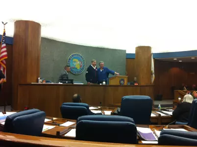 Doug Bruno and Cook County Board President Toni Preckwinkle during Tuesday's ceremony honoring the DePaul coach.