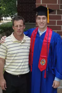 Men's Soccer head coach Craig Blazer with Joe Ferrari at Friday's graduation lunch.