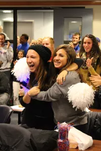 Rebekah Roller (left) and Danielle Pitaro celebrate DePaul's selection to the NCAA Women's Soccer Championship.