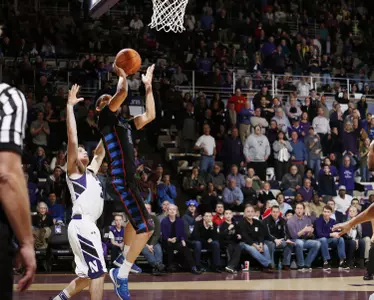 Billy Garrett Jr. beats the buzzer to lift DePaul over Northwestern at Welsh-Ryan Arena.