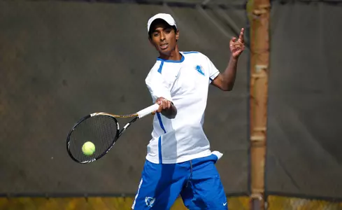 Paul John improved to 4-4 overall with a win at fifth singles.
