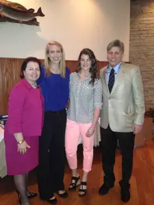 Blue Demon seniors Katherine Harry and Anna Martin pose with DePaul's Director of Athletics Jean Lenti Ponsetto and head coach Doug Bruno at Tuesday's end of the year celebration.
